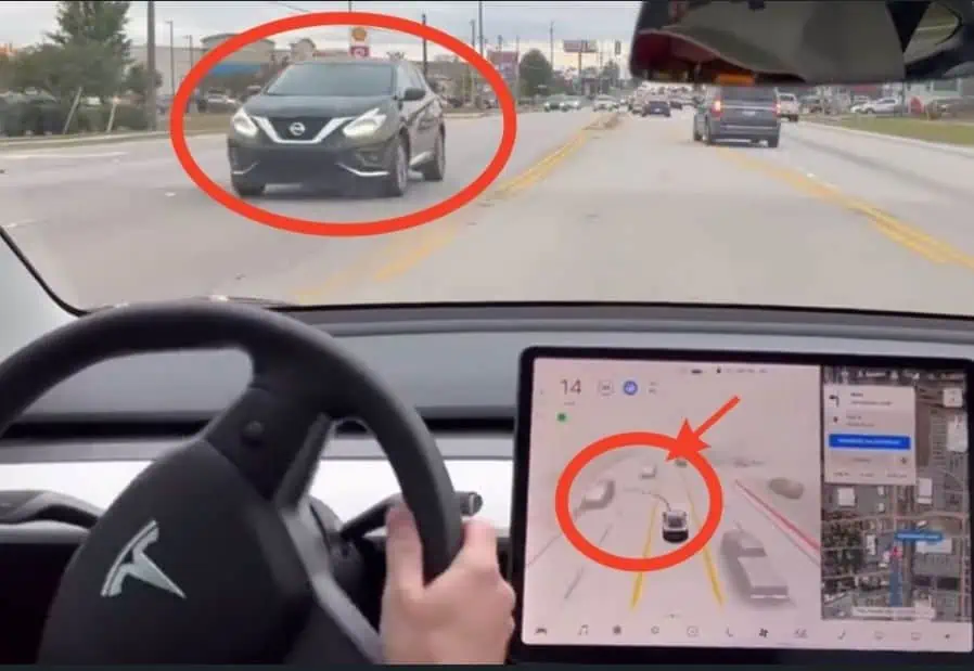 A Tesla attempts to turn pretty aggressively in front of opposing traffic.