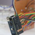 Microcontroller board connects to an electronic project