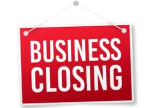 Business closing hanging sign.